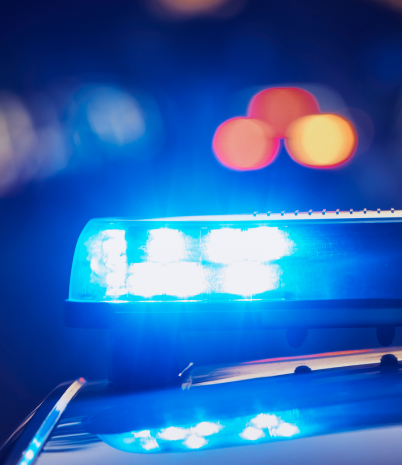 Blue police lights at night.